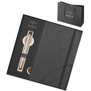 Parker IM Champagne täitesulepe karbis, milles on märkmik ja kinkekott